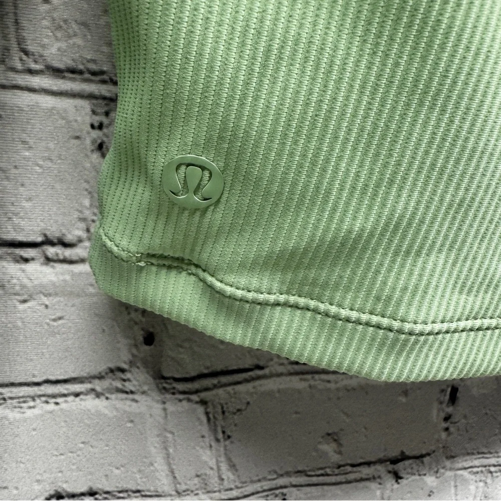 Lululemon Mint Green Long Sleeve Robbed open back crop top size Small
